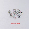 Vista macro de anillas abiertas de acero inoxidable arcoíris 1,2x7mm para joyería DIY - 100 Piezas/Paquete / Arcoíris