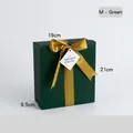 Dark green folding gift box with gold ribbon and white tag for festive packaging - M Green - Folding Gift Box with Ribbon
