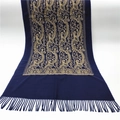 Detail of dark blue scarf featuring gold paisley embroidery and elegant fringed edges - Blue