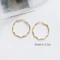 Fashionable 4.2cm diameter golden twisted hoop earrings with elegant wave texture - 4.2cm / Gold