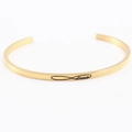 Gold stainless steel cuff bracelet with engraved Love text and infinity symbol - Forever Love