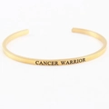 Gold stainless steel open mantra bracelet engraved with Cancer Warrior text - CANCER WARRIOR