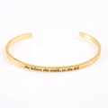 Polished gold stainless steel mantra cuff bracelet with inspirational engraving - she believed she could so she did