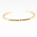 Golden stainless steel C-shaped mantra bracelet with Everything Is Possible engraving - EVERYTHING IS POSSIBLE