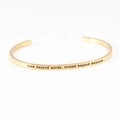 Gold-plated C-shaped stainless steel cuff bracelet with sentimental black engraving - Love beyond words missed beyond measure