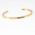 Golden stainless steel cuff bracelet with Wise Mind engraving for men and women - WISE MIND