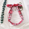 Red plaid knotted Christmas headband with rabbit ear bow for women on magazine background - White
