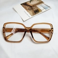 Retro oversized square glasses frame in transparent amber brown with metal temple detail - Champagne