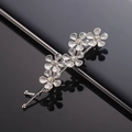 Silver branch hair clip with five floral patterns and crystal rhinestones on black surface - Silver Five Flower