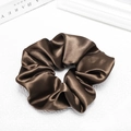Detailed view of dark brown satin scrunchie showing silky texture and elegant folds - Coffee