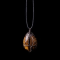 Tiger Eye Crystal necklace with copper wire-wrapped tree of life pendant on black cord - Tiger's Eye