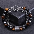 Close-up of tiger eye and black onyx beads with steel chain and T-bar clasp detail - Tiger Eye + Obsidian + Magnetic Stone Bracelet