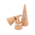 Three elegant rings displayed on solid wood cone holders with minimalist jewelry stands - Conical 3-Piece Ring Stand Set
