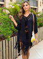 Detail of black crochet beach cover-up featuring intricate hollow knit and long tassels - One Size / Black