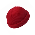 Detail of red knit docker hat showing fine ribbed texture and round rolled edge design - Adult / Red