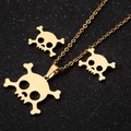 Golden minimalist skull and crossbones jewelry set with necklace and stud earrings - Skull / Gold