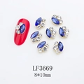 Detail of 8x10mm royal blue marquise rhinestone and gold alloy nail art decoration - Gold Base Royal Blue with White (LF3669)