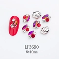 Macro shot of 8x10mm K9 horse eye mixed nail art rhinestones with metal edges - Silver Base Purple with Red (LF3690)