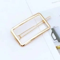 Minimalist gold rectangular hollow geometric hair clip with a polished metallic finish - Square