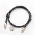 Gray braided PU leather bracelet featuring a silver metal heart charm and toggle ends - Gray
