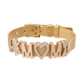 Detail of golden mesh bracelet with MOM pendant, star and bow charms with rhinestones - Gold Mesh/MOM Letter/Heart/Bowknot / Gold