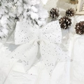 Detalle de primer plano de un lazo de Navidad blanco brillante con lentejuelas plateadas - 12*15CM (2 Unidades/Pack) / Blanco