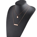 Detail of rose gold double layer necklace with bar and disc pendants on black bust - Rose Gold (MP587)