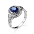 Silver ring with oval blue gemstone and small diamonds on a clean white background - Oval Blue Zircon Style (95738-)