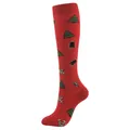 Red Christmas compression socks featuring festive patterns and green holiday trees - Red Base Christmas Tree & Bells