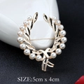 Elegant gold laurel wreath brooch featuring white pearls with 5cm x 4cm size dimensions - xz4122A Wreath