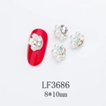 Macro detail of 8x10mm horse-eye rhinestone and pearl nail art charms on red nails - Silver Base Aurora with Pearl (LF3686)