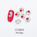 Macro view of 8x10mm marquise nail art rhinestones with gold metal borders and crystals - Silver Base White Aurora (LF3684)
