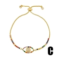 Bracciale dorato regolabile malocchio con cristalli multicolori vivaci e strass lucidi - Stile C-Occhio Pavé Sfumato