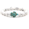 White turquoise beaded bracelet with a green turtle charm and natural stone texture - Green Turtle White Turquoise