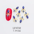 Detailed view of vintage nail art gems with blue rhinestones and gold alloy settings - Gold Fleur-de-lis Royal Blue Rhinestone Style (3732)