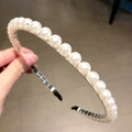 Elegant pearl headband featuring white faux pearls and silver metal frame for women - Single Row Large Pearls