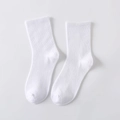 Solid white mid-calf cotton socks with vertical ribbed knit texture for women - White