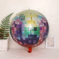Detail of colorful 4D disco ball aluminum balloon on a soft white carpet background - 4D Sphere Colorful Disco / 22 Inch
