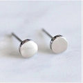 Minimalist round titanium steel stud earrings with silver brushed finish on marble - Round / Steel