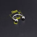 Macro detail of silver stainless steel horseshoe piercing with 8mm inner diameter dimensions - Circular Barbell/Ball/10mm