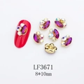 Detailed 8x10mm purple horse-eye nail gem with gold setting and iridescent stones - Gold Base Purple Aurora with AB (LF3671)