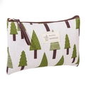 Close-up of canvas makeup bag showing green tree patterns and natural style label - Green Tree / Large