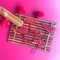 Set of 5 red acrylic cloud cake toppers with gold edges displayed on bamboo mat - Red Gold Lucky Cloud / 5 Pieces