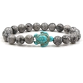 Handmade beaded bracelet with white marble stones and a green turquoise turtle charm - Green Turtle Map Stone