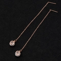 Rose gold pull-through earrings with CD logo circular zircon pendant on black background - CD Inlay Zircon (8311)