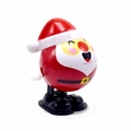 Wind-up Santa Claus toy with classic red hat and white knob on a clean white background - New Style Wind-up Santa Claus