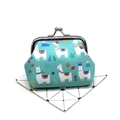 Close-up of blue canvas coin purse featuring cartoon alpaca prints and metal clasp closure - Alpaca No. 5
