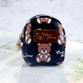 Mini backpack coin purse in black faux leather featuring cute teddy bear patterns - Black