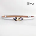 Silver adjustable skinny belt for dresses featuring a golden fish buckle with pink crystals - Silver Fish Gem