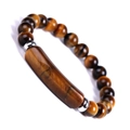 Macro view of brown tiger eye stone bracelet with rectangular focal bead and silver spacers - Tiger's Eye